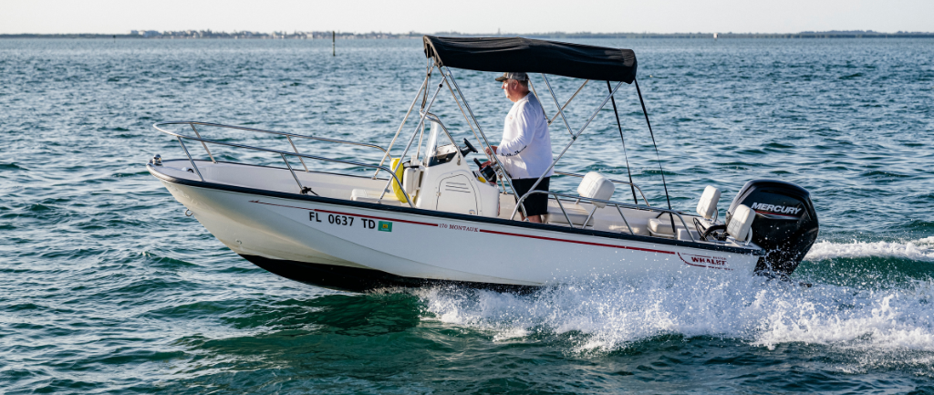 Man driving preowned boston whaler boat